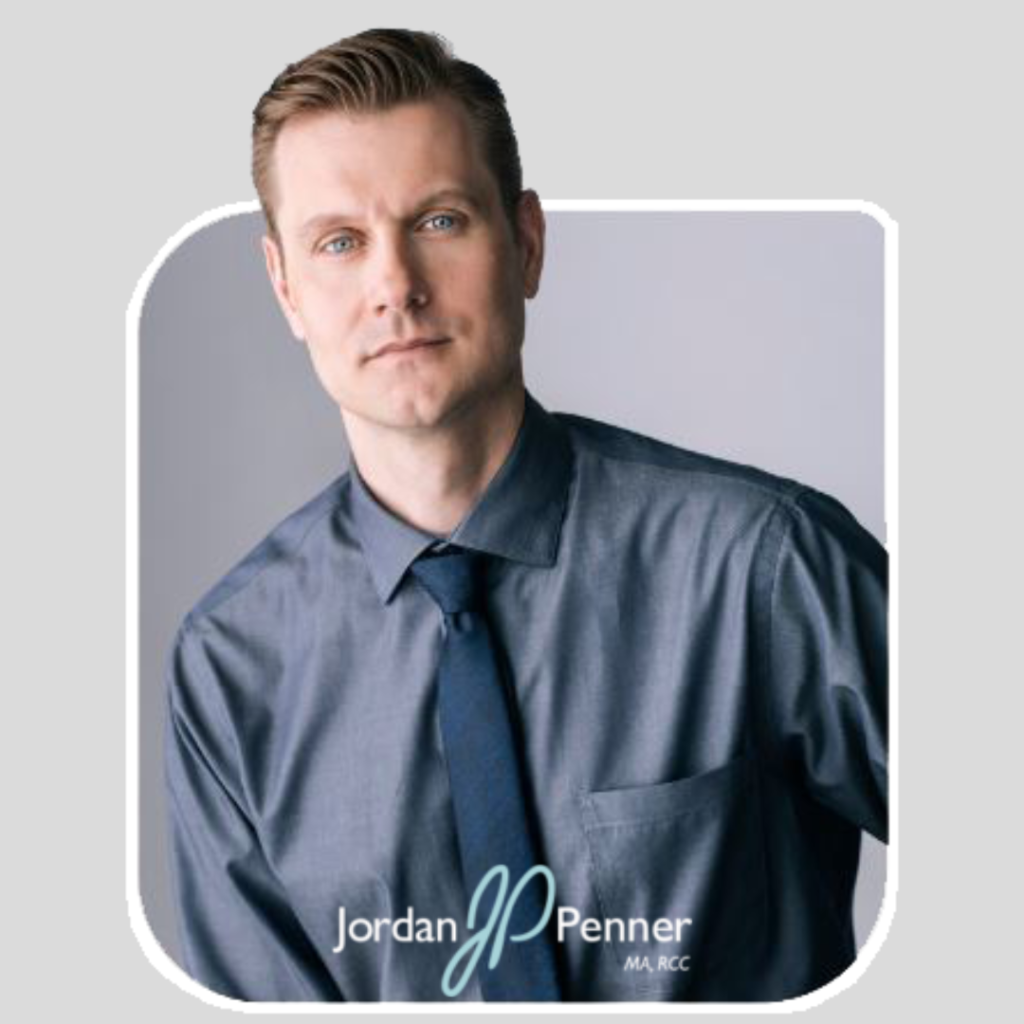 A man in a blue-gray shirt and navy tie poses against a light gray background. Text at the bottom reads "Jordan JP Penner MA, RCC - Surrey Counselor.